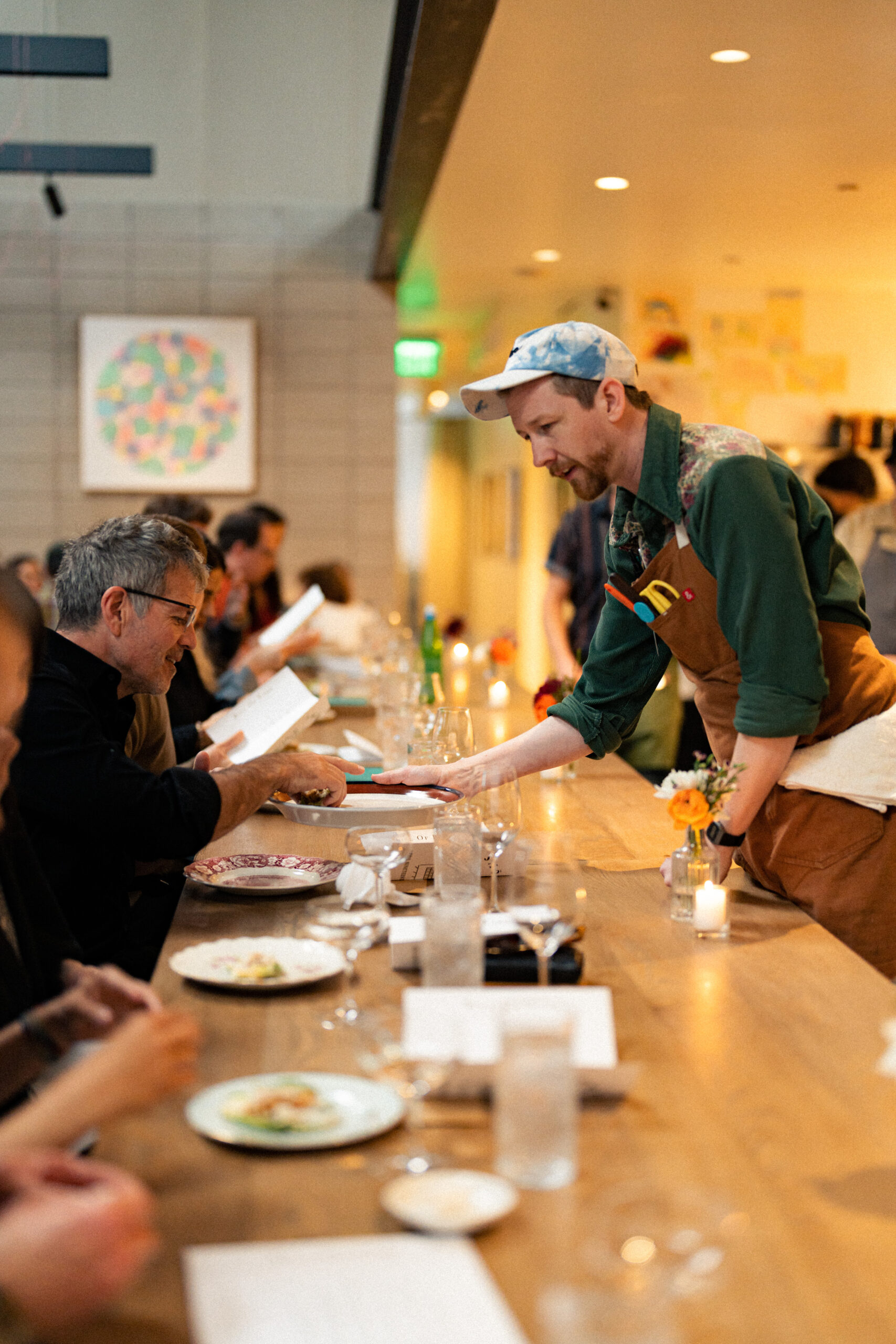 Chef CJ talking through the tasting menu with Smorgasbird guests